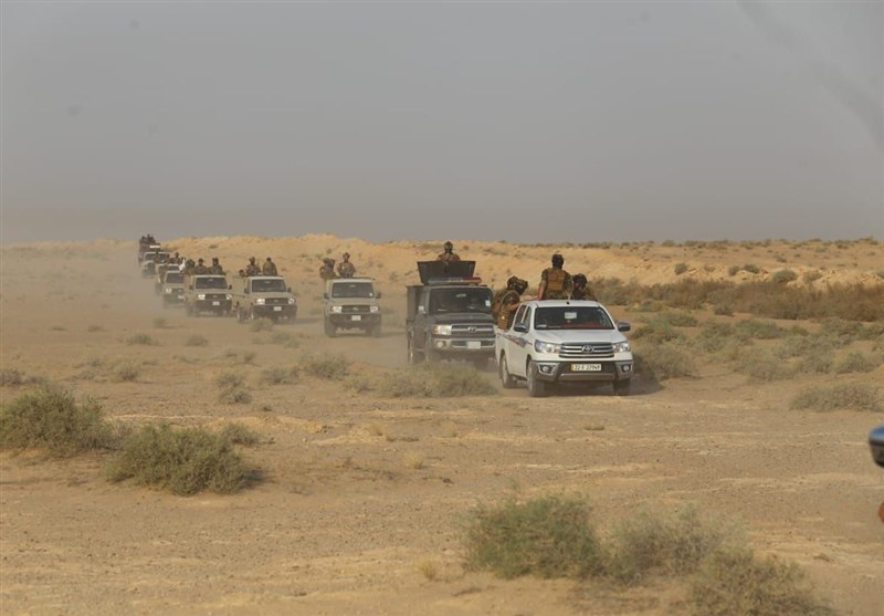 رزمایش حشد الشعبی در نزدیک مرز با سوریه