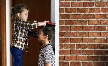 آیا بلوغ زودرس قد کودک را کوتاه میکند؟ / بعضی والدین اصرار دارند جلوی بلوغ کودک گرفته شود